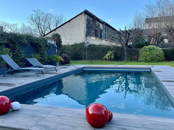 Appartement de vacances pour 4 personnes, avec Balcon et Terrasse ainsi que Jardin et Piscine
