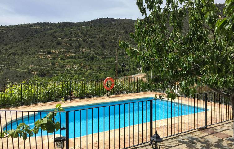 Cozy Laroya Apartment: WiFi, AC, Fireplace, Pool, Grill in Laroya, Cordillera Penibética