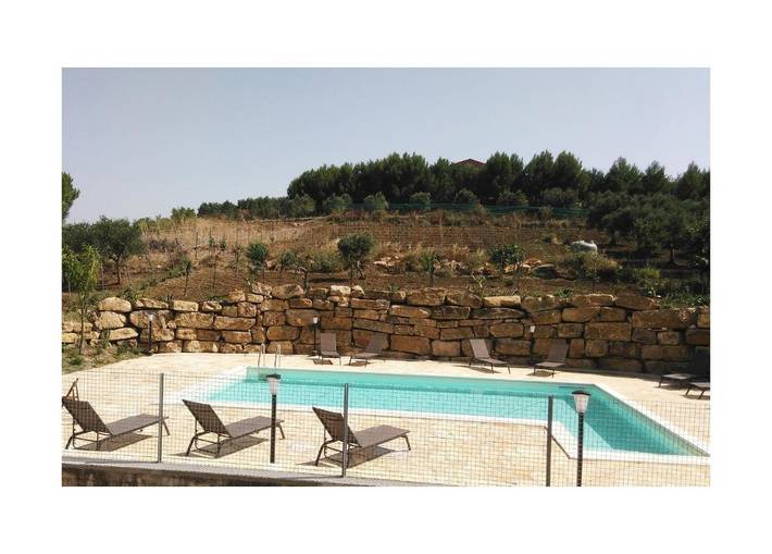 Ferienwohnung für 3 Personen, mit Terrasse und Garten sowie Pool
