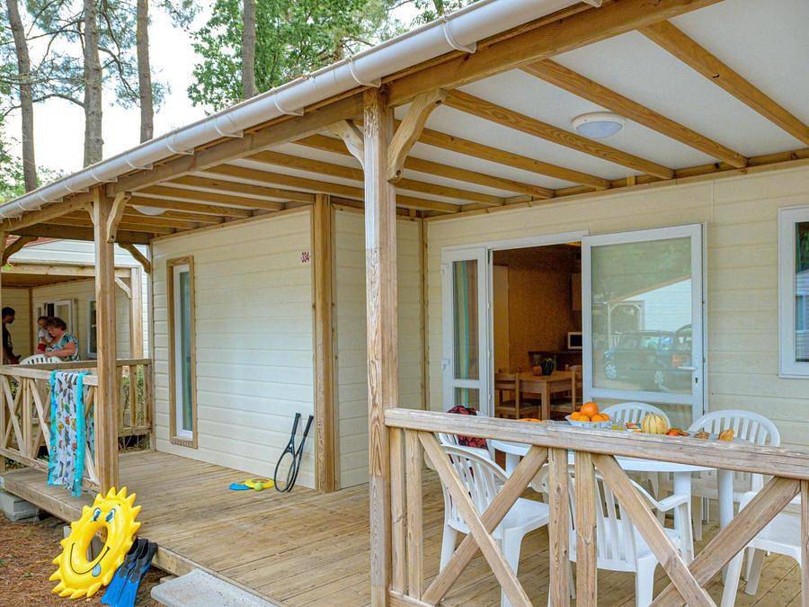 Flower Camping Au Bois des Biches - Chalet 7 persons - 3bed (without Tv)-covered terrace- 32m² | Standard in Saint-Hilaire-de-Riez, Loire Valley