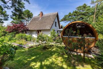 Ferienhaus für 4 Personen, mit Sauna und Ausblick sowie Garten in Wustrow