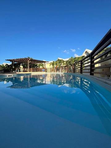 Gîte pour 4 personnes, avec piscine ainsi que vue et jardin dans Plage de Bois Jolan