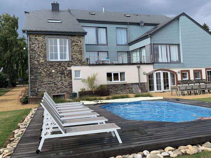 Vakantiehuis voor 12 personen, with Terras and Tuin as well as Zwembad and Sauna in Houffalize