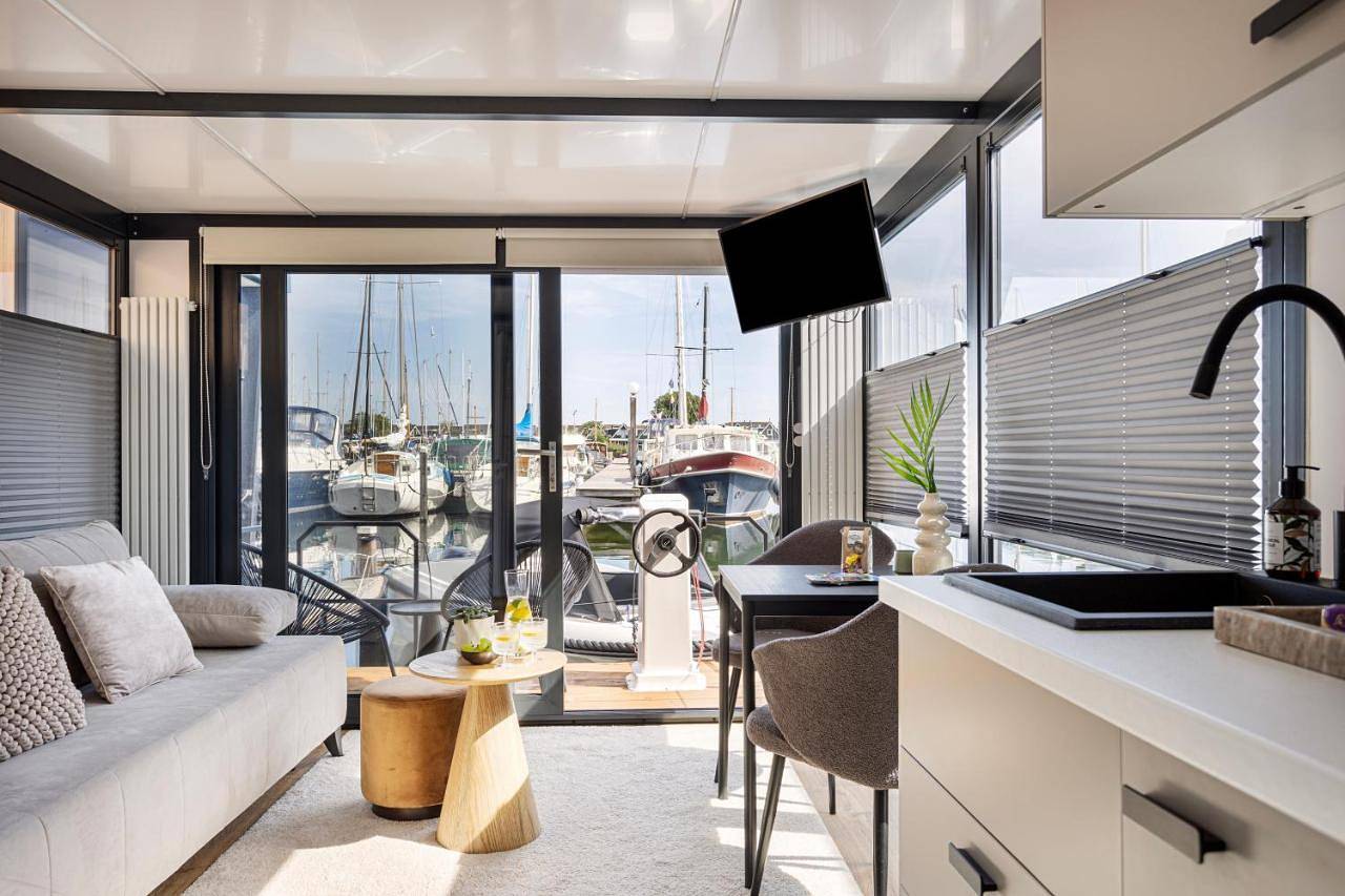 Cosy tiny houseboats near beach and restaurants by Weltevreden Experience in Zeewolde, Flevoland