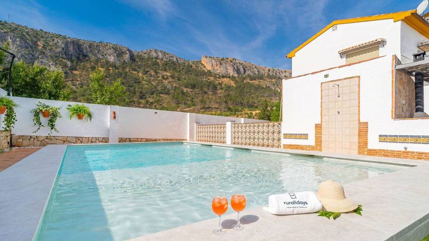 Casa de vacaciones para 12 personas, con piscina y balcón/terraza en Cuevas de San Marcos