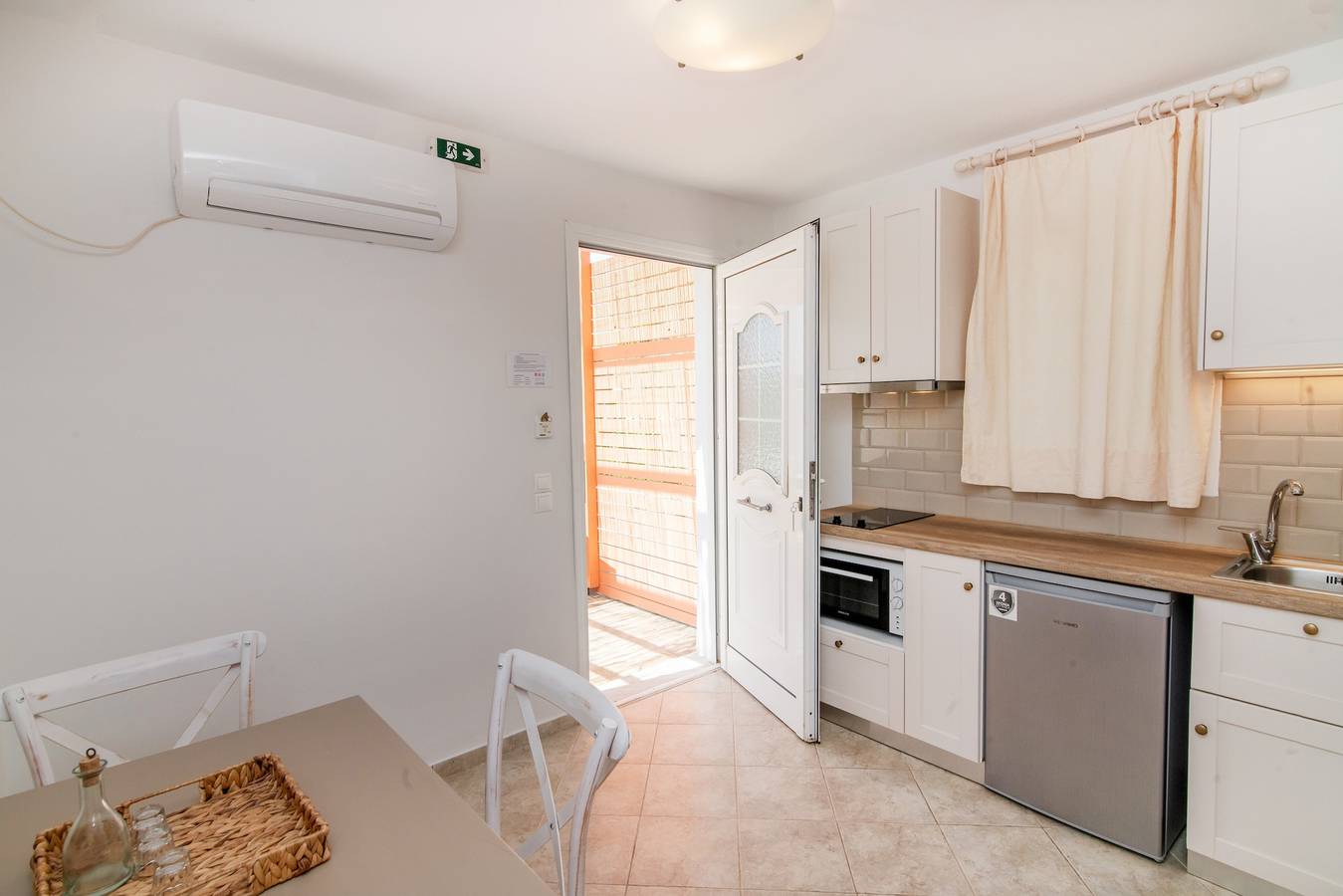 Casa de férias 'Anemologio 204 Tinos' com vista para o mar, Wi-Fi e ar condicionado in Ormos Agiou Ioannou, Tinos