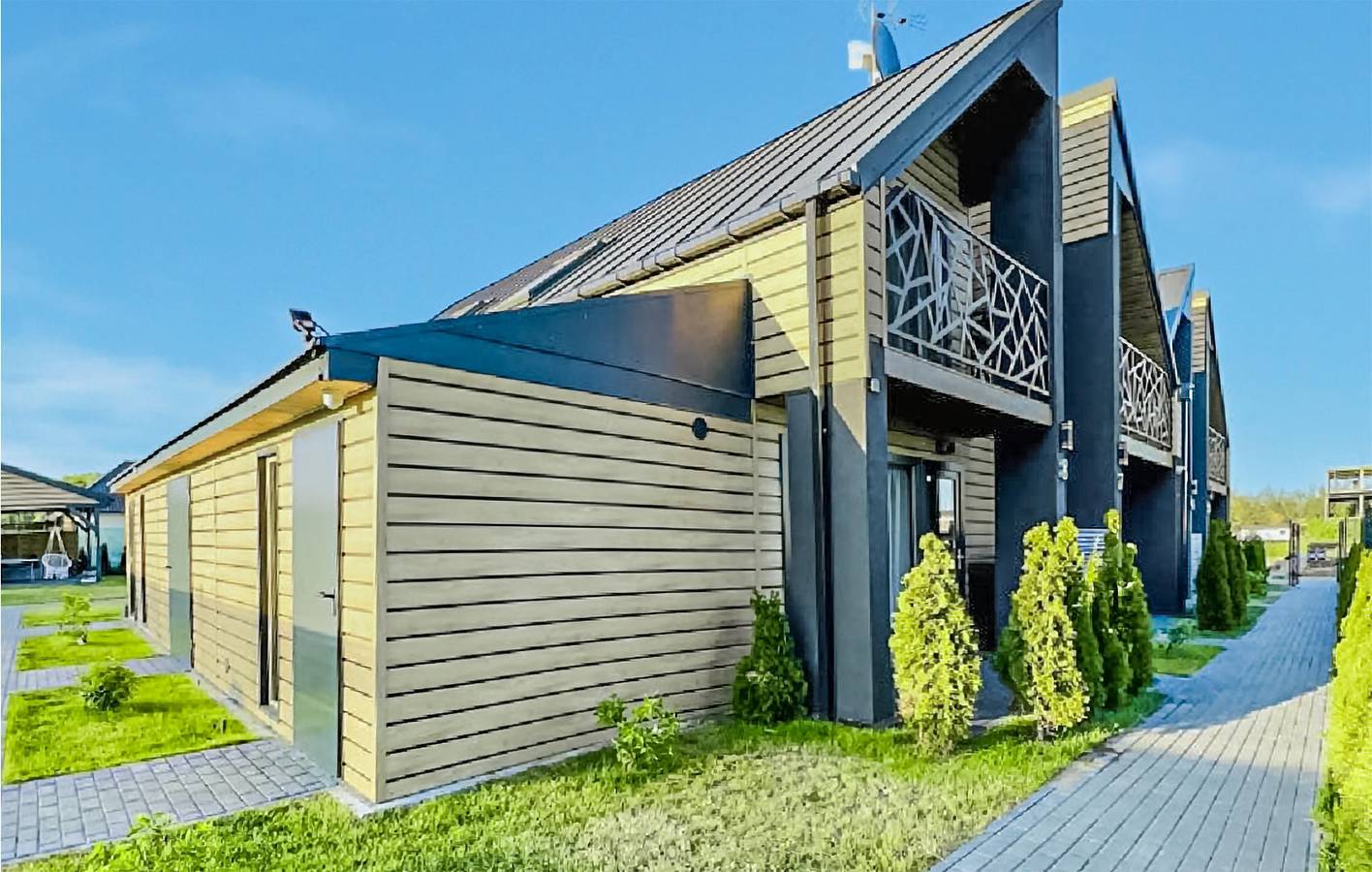 Ferienhaus für 6 Personen mit Terrasse in Sarbinowo, Powiat Koszaliński