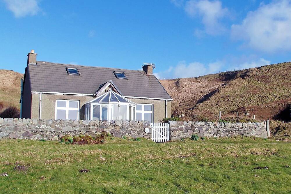 A detached cottage with views across to Gigha and the Paps of Jura. in Argyll & Bute