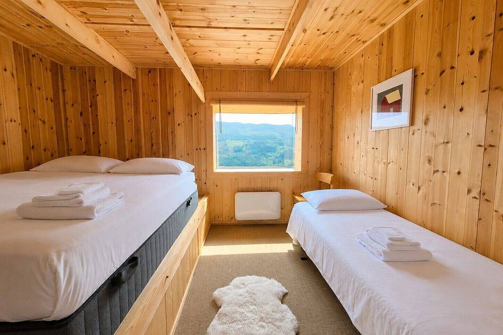 Architect designed sleeping box in barn in Ål