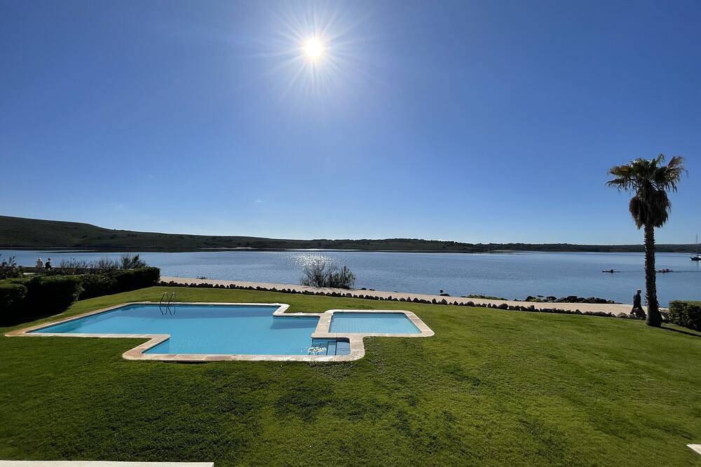 Entire apartment, Very front line stunning sea views near the beach in Fornells, Es Mercadal