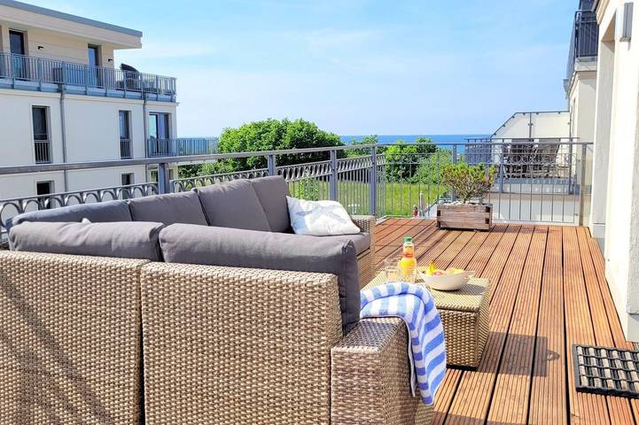 Ferienwohnung mit Meerblick für 4 Personen, mit Balkon und Balkon/Terrasse sowie Terrasse in Börgerende-Rethwisch