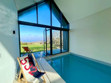 Gîte pour 10 personnes, avec sauna et piscine ainsi que jacuzzi et jardin dans Plage de l'île-à-Poule