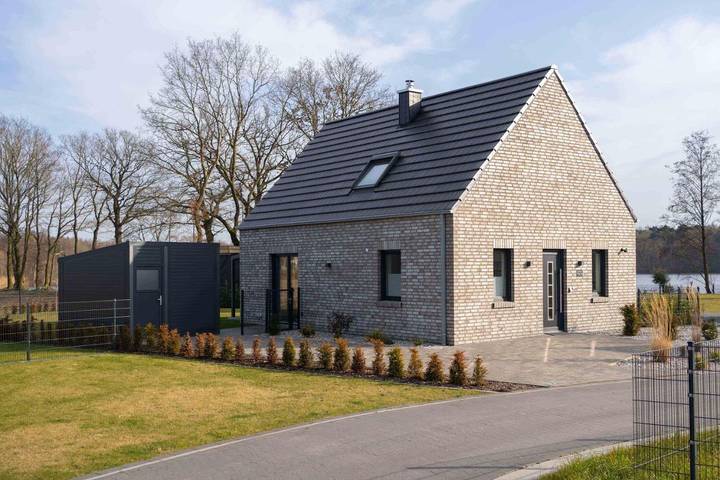 Ferienhaus für 5 Personen, mit Terrasse und Garten sowie Sauna und Seeblick in Barßel