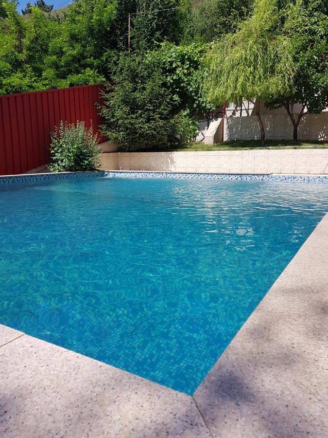 Appartement de vacances pour 3 personnes, avec jardin ainsi que piscine et vue