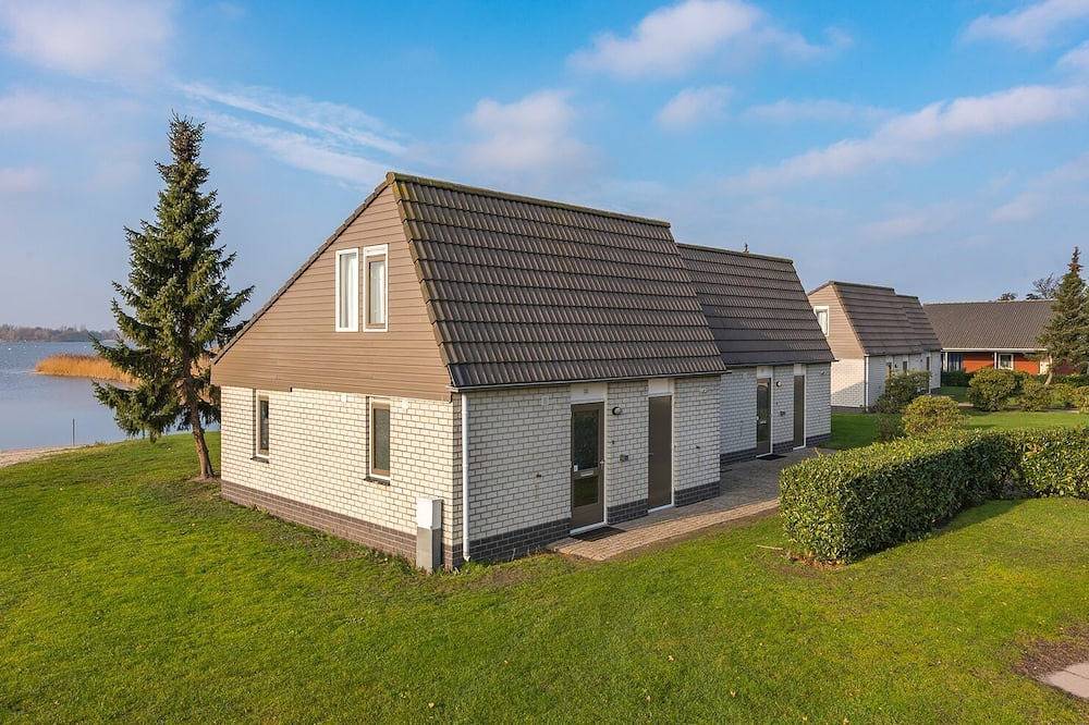 Vrijstaande bungalow met uitzicht over het Veluwemeer of gelegen aan een binnentuin. in Elburg, Veluwemeer