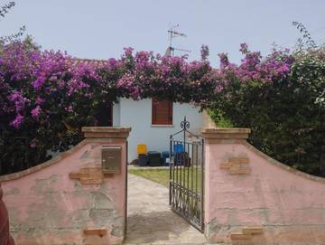 Location de vacances pour 4 personnes, avec terrasse et jardin, adapté aux familles à Porto Pino