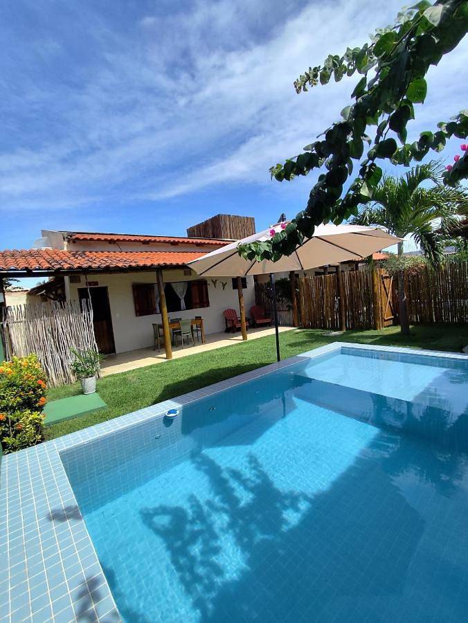 Casas e apartamentos de temporada para 4 pessoas, com vista e piscina infantil e ainda jardim and piscina em Porto de Pedras