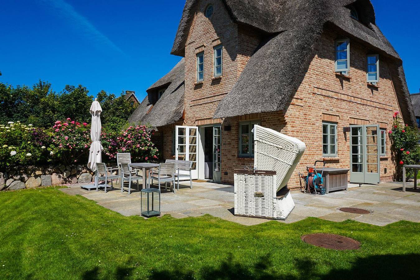 Luxushausteil unter Reet. Ca. 126 qm Nutzfläche für bis zu 6 Gäste im Eg/Ug/Og in Wenningstedt, Sylt