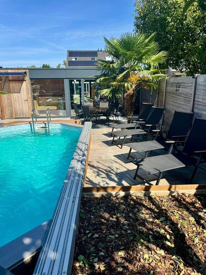 Chambre d’hôte pour 4 personnes, avec Jacuzzi et Terrasse ainsi que Jardin et Piscine à Herzele