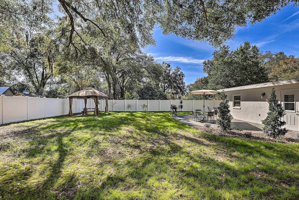 Chic Home w/ Fire Pit & Patio, Walk to Lake! in Mount Dora, Lake County