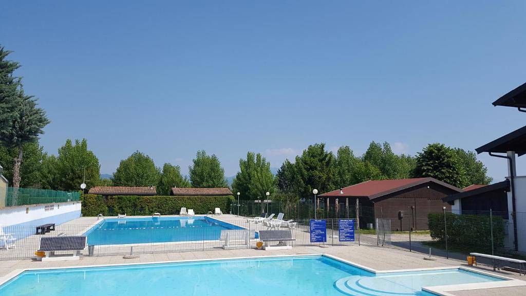 Camping Iris Park Bungalow Agoda für 7 Personen in Moniga del Garda, Gardasee-Berge