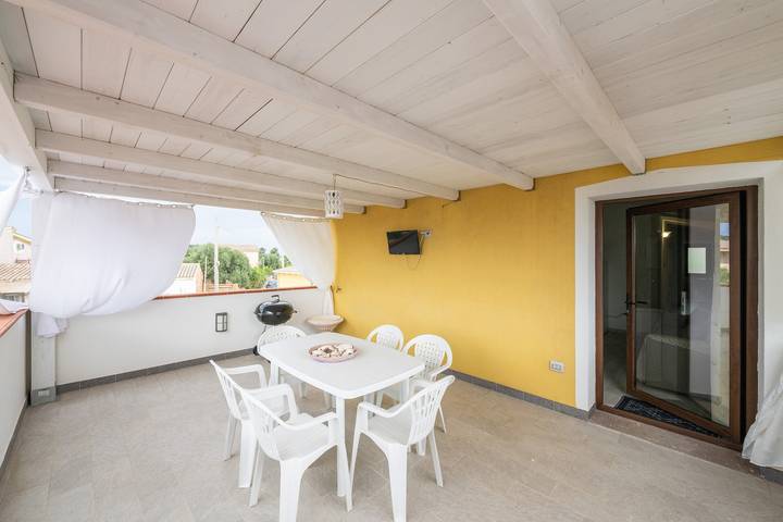 Casa de vacaciones 'Il Tramonto' con terraza y Wi-Fi in Is Potettus, Sant'Anna Arresi
