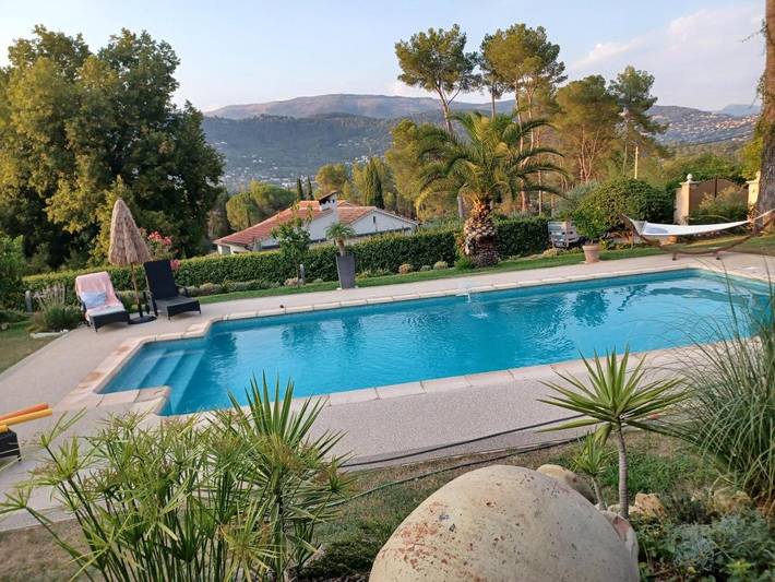 Appartement de vacances pour 5 personnes, avec Terrasse et Jardin ainsi que Piscine et Vue