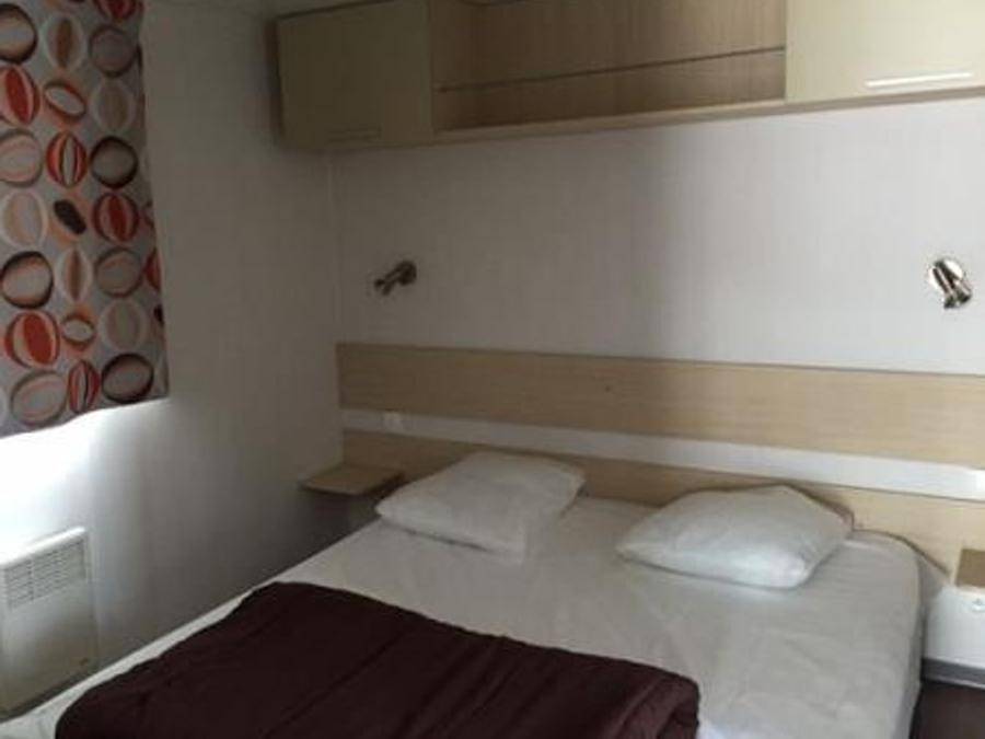 Camping Les Catalpas - Mobilheim 2 personen - H 28G Clim Conf 1 ch Ideal Paar Bett 160 in Fumel, Quercy