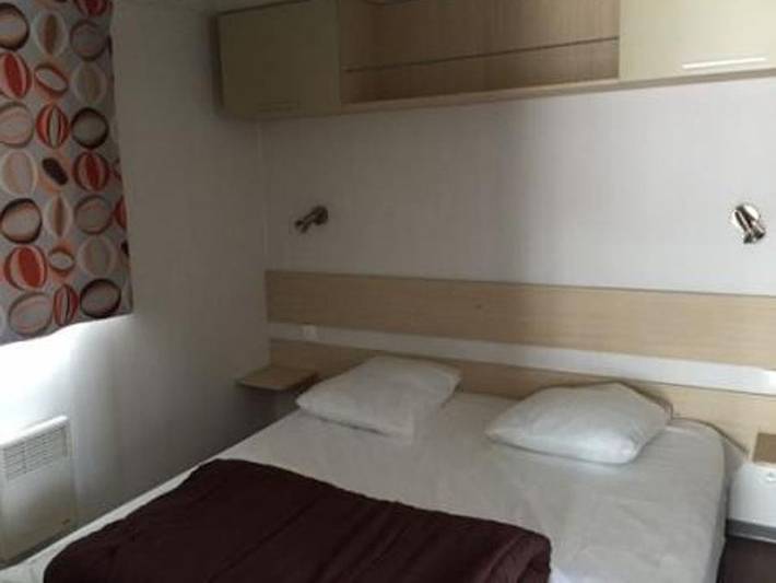 Camping Les Catalpas - Mobilheim 2 personen - H 28G Clim Conf 1 ch Ideal Paar Bett 160 in Fumel, Quercy