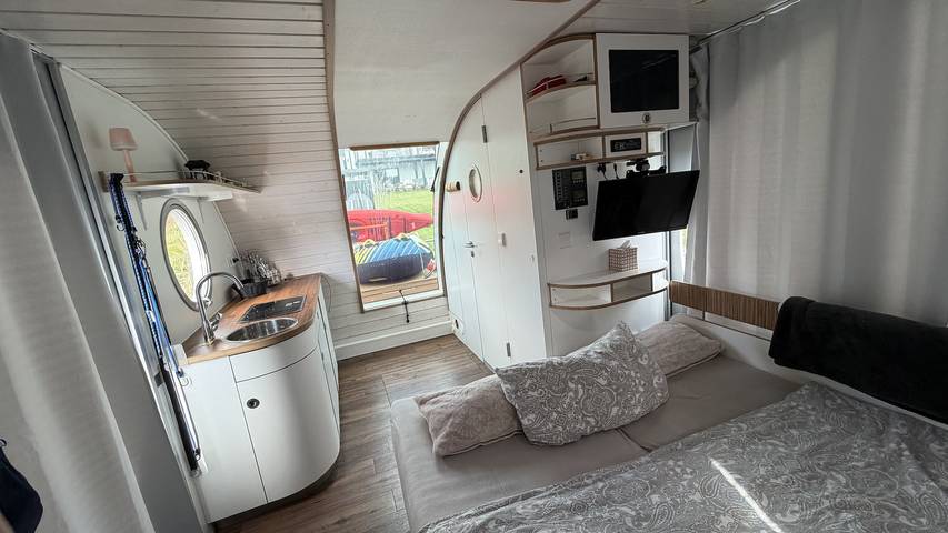 Hausboot 'Monpti - Hausboot Seeliebe' mit Seeblick und privater Terrasse in Templin, Barnimerland Region