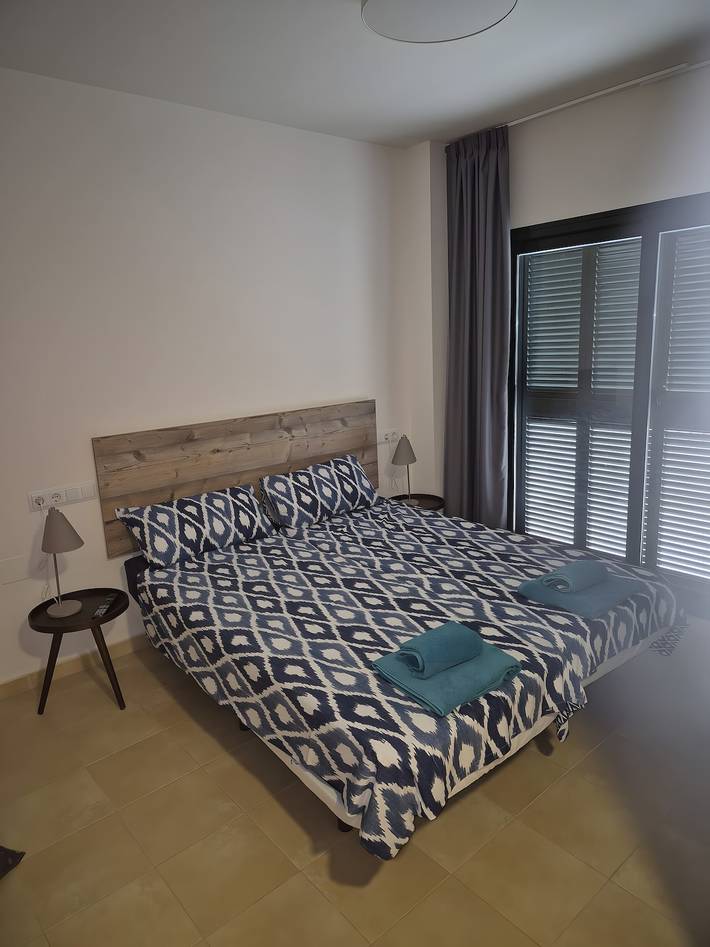Ganze Wohnung, Apartment „Casa Wood“ mit Gemeinschaftspool, privater Terrasse und WLAN in Hacienda del alamo, Fuente Alamo de Murcia