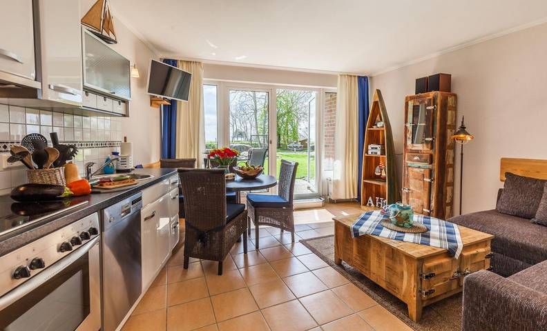 Ferienwohnung für 4 Personen, mit Garten und Seeblick sowie Sauna und Pool in Kronsgaard