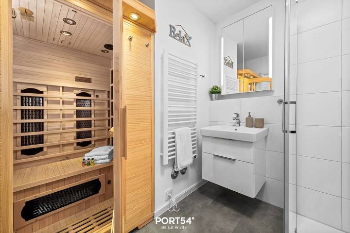 Ganze Wohnung, Ferienwohnung Sundowner im Nordseeresort - Terrasse, Kaminofen, Dusche, Infrarotkabine, Fußbodenheizung in Büsum, Kreis Dithmarschen