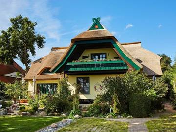 Ferienwohnung für 2 Personen, mit Ausblick und Seeblick sowie Terrasse und Garten, mit Haustier in Middelhagen