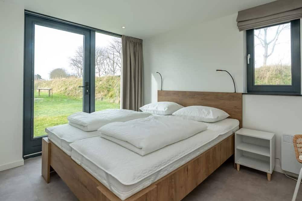 Willkommen im Chalet 7 im Riethoek Westerschouwen, wo Ruhe, Komfort und Natur zusammenkommen. Betret in Burgh-Haamstede, Zeeuwse Kust