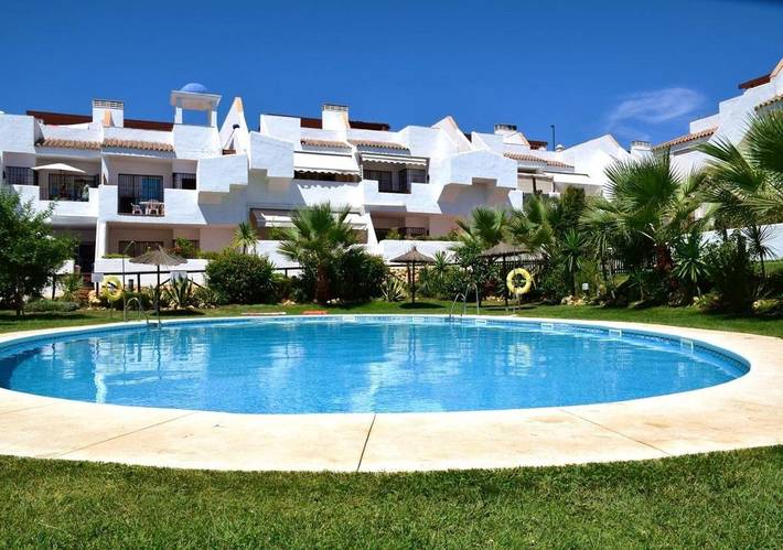 Apartamento de férias para 4 pessoas, com jardim e piscina e ainda vista and piscina infantil em Islantilla