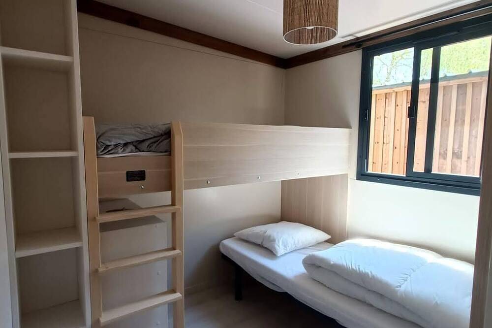 Chalet en bois de 35m2 avec 3 chambres et une terrasse de 17m2 in Onesse-Laharie, Landes
