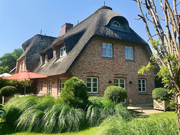 Ferienhaus für 4 Personen, mit Ausblick und Sauna sowie Garten in Archsum
