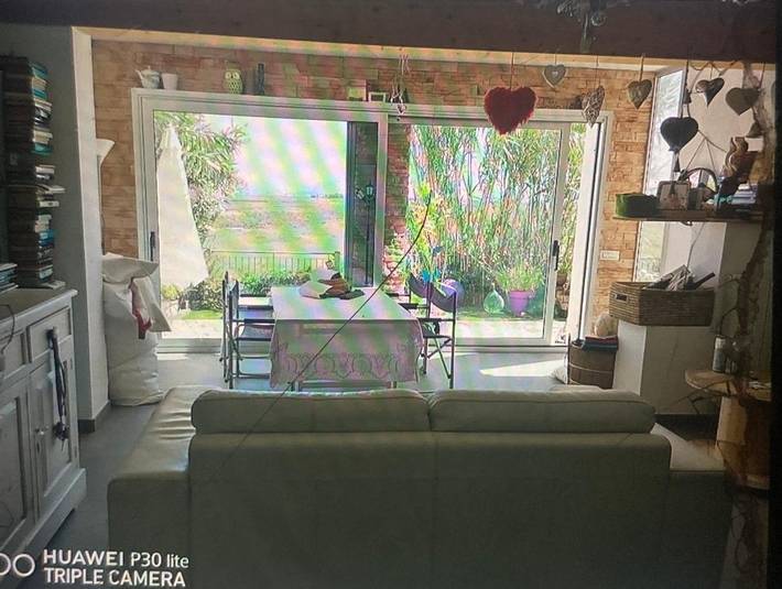 Ferienwohnung für 4 Personen, mit Terrasse und Garten sowie Seeblick und Ausblick