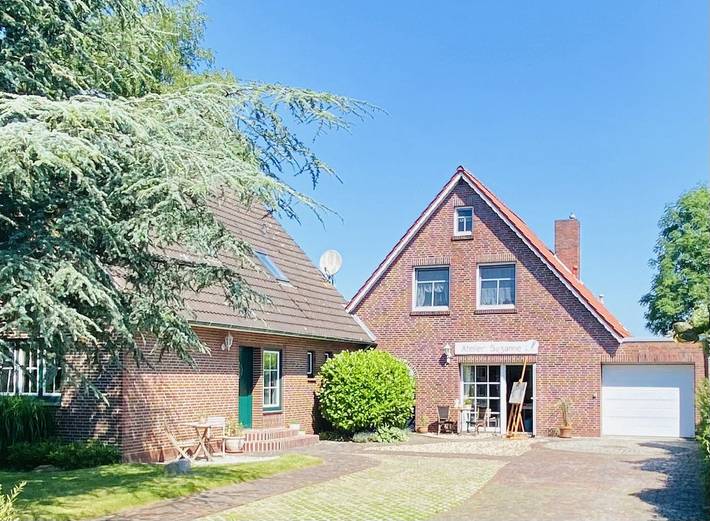 Ferienhaus für 5 Personen, mit Balkon und Garten