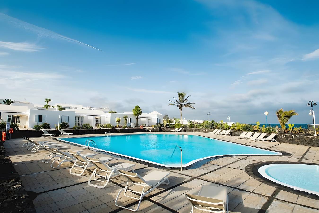 Ferienhaus 'Caleta Campos Bungalows' mit Meerblick, Gemeinschaftspool und Wlan in Punta de las Mujeres, Haría