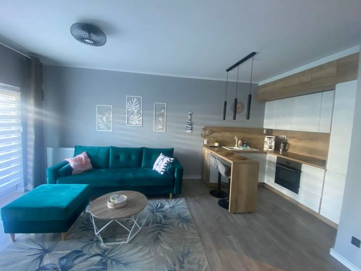 Ferienwohnung für 4 Personen, mit Terrasse und Garten sowie Ausblick in Dziwnówek