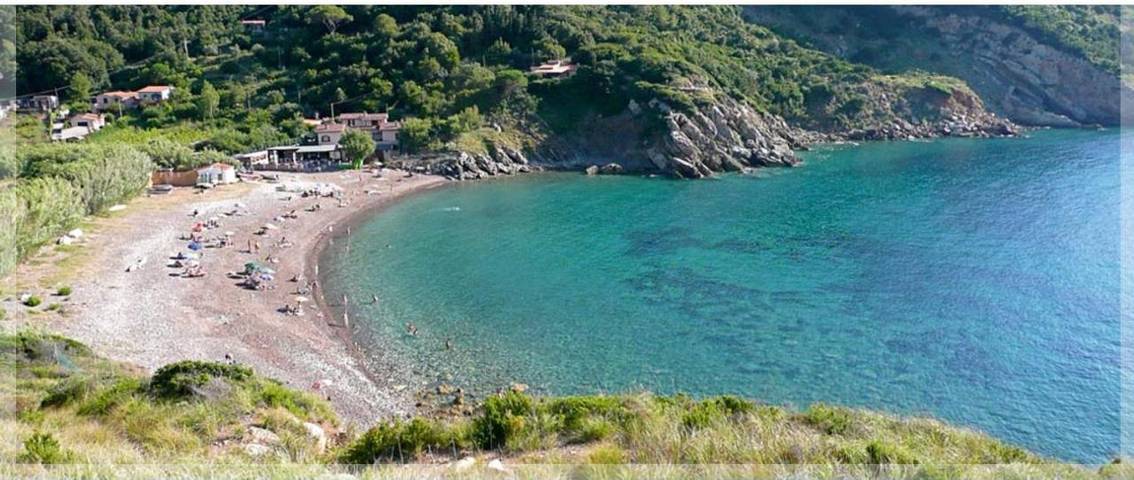Appartamento per 5 persone, con giardino e terrazza nonché piscina e panorama in Rio nell'Elba