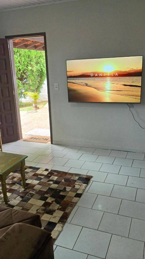 Casas e apartamentos de temporada para 8 pessoas, com jardim e piscina na Praia Daniela