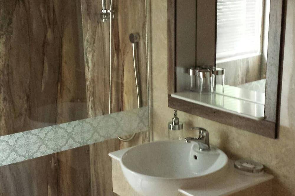 Luxury pine log cabin positioned within the mountains of the Lake District in Skelwith Bridge, Lake District
