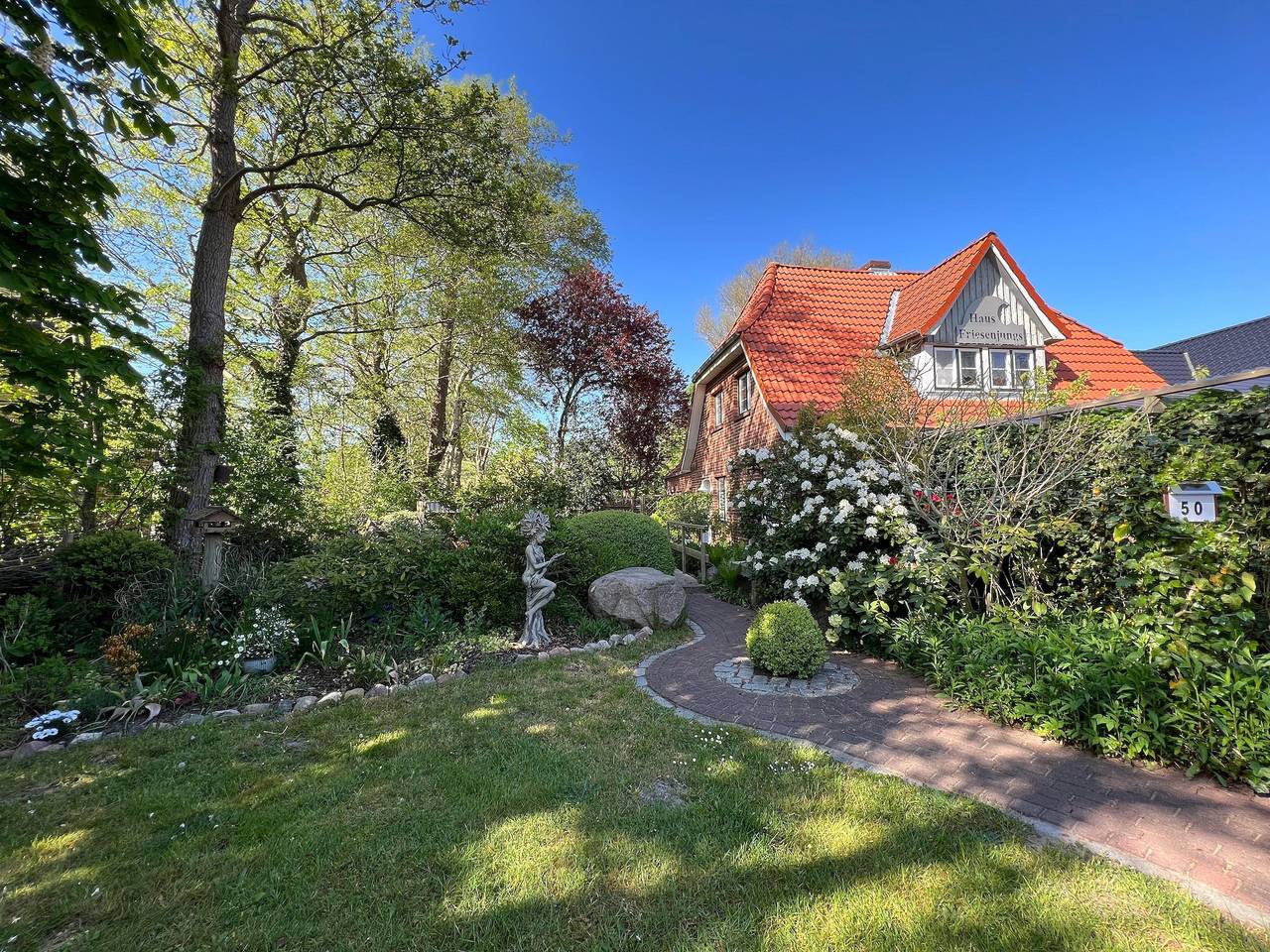 Ganze Ferienwohnung, Ferienwohnung Haus Friesenjungs - zentral gelegen mit Terrasse und Garten in St. Peter-Ording, Eiderstedt