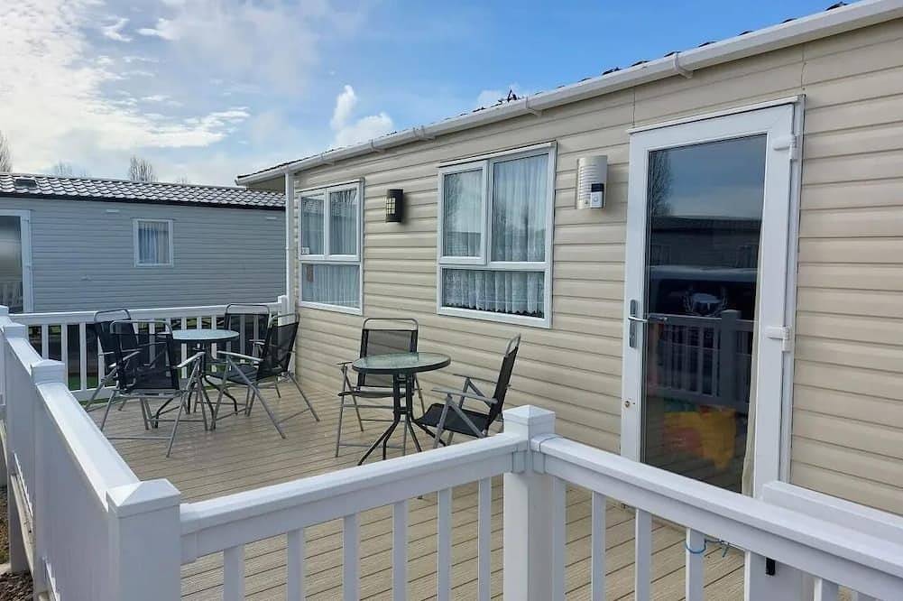 Cosy caravan with side decking at Felixstowe Beach Holiday Park in Felixstowe, Suffolk