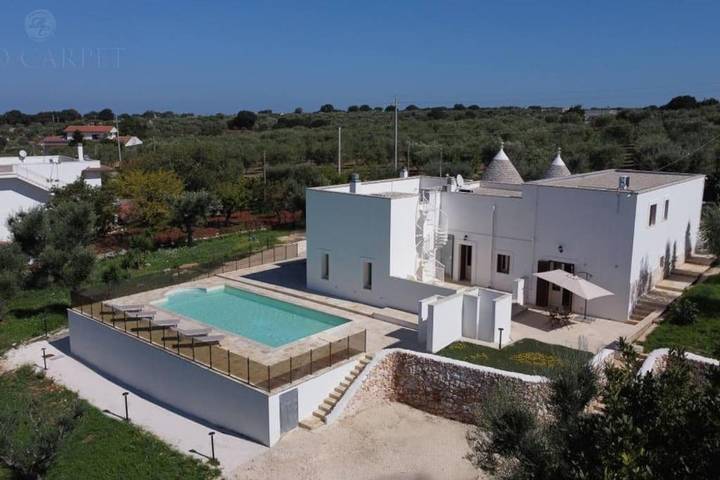 Maison de vacances pour 8 personnes, avec Balcon et Terrasse ainsi que Jardin et Piscine à Santa Lucia (Bari)