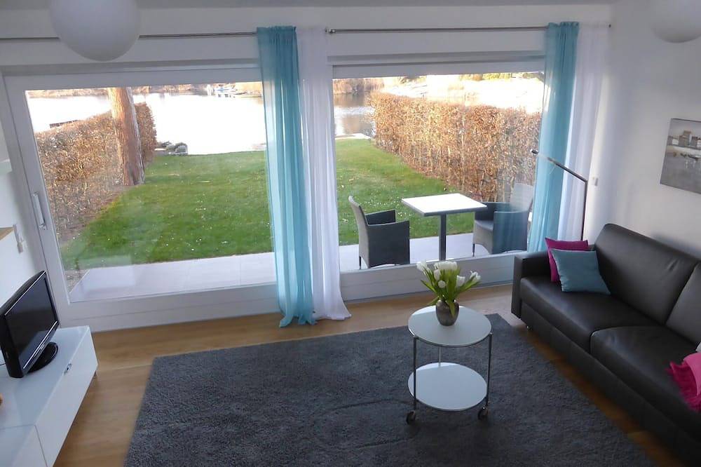 Modernes Ferienhaus mit direktem Seezugang in Ketsch, Rheinebene