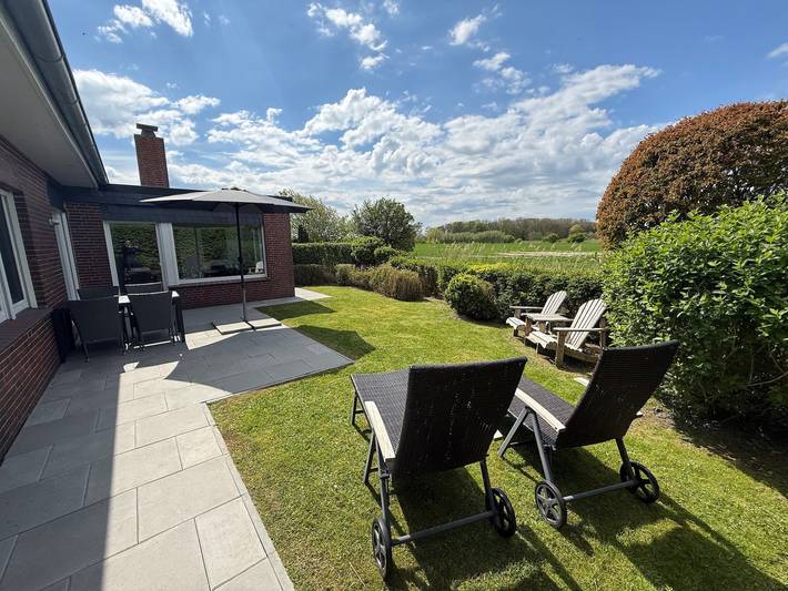 Casa de vacaciones 'Norderneyweg 10' con terraza y jardín in Schillig Strand, Wangerland